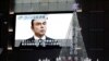 在日本东京街头的一个大型电视屏幕上播放有关日产汽车公司前董事长卡洛斯·戈恩被逮捕的新闻。 （2018年11月21日）