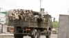 FILE - Soldiers are seen on a truck along a road in Maiduguri in Borno State, Nigeria, May 14, 2015. 