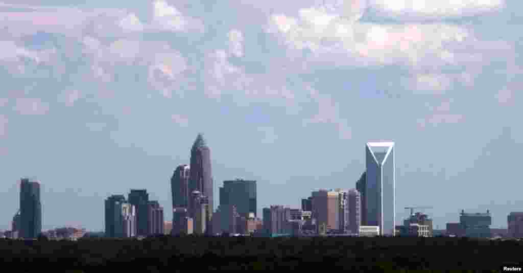 The Charlotte, North Carolina skyline seen through the window of an airplane, September 2, 2012.