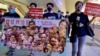香港社民連主席陳寶瑩（右起）與外務副主席周嘉發、成員余煒彬及前東區區議員曾健成，在十一中國國慶日遊行，要求全中國實行普選、釋放所有政治犯。(資料照片：美國之音湯惠芸拍攝)