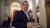 FILE - In this Feb. 3, 2017 file photo, Sen. Ted Cruz, R-Texas, departs the Senate chamber on Capitol Hill in Washington. 