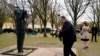 U.S. Secretary of State Mike Pompeo, left, walks to a motorcade vehicle after stepping off a plane at Paris Le Bourget Airport, Nov. 14, 2020, in Le Bourget, France.