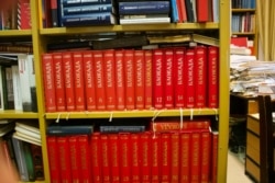 The red-bound ‘memory books’ contain the names of those slaughtered in Stalin’s Great Terror. The victims were dispatched with a bullet to the back of the head, if lucky, or died while tortured or in labor camps. (Jamie Dettmer/VOA)