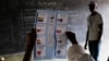 FILE - Election officials start counting the ballots after polls closed in the presidential elections in Bujumbura, Burundi, July 21, 2015. 