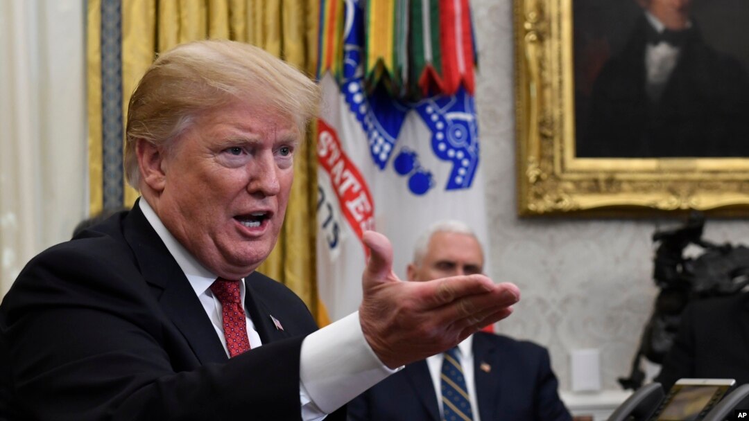 FILE - President Donald Trump speaks during a meeting in the Oval Office of the White House in Washington, Jan. 31, 2019.