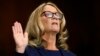 Christine Blasey Ford is sworn in before the Senate Judiciary Committee, Sept. 27, 2018 on Capitol Hill in Washington. 