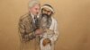 In this photo of a sketch by courtroom artist Janet Hamlin and reviewed by the U.S. Department of Defense, Khalid Sheikh Mohammed consults with his civilian attorney David Nevin during a break of his military hearing at the Guantanamo Bay U.S. Naval Base 