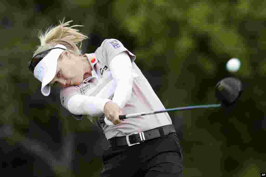 Brooke Henderson of Canada hits off the 10th tee during the first round of the KPMG Women's PGA Championship golf tournament in Chaska, Minnesota.