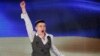 Ukrainian pilot Nadiya Savchenko, who was freed two days earlier from a Russian jail, shouts patriotic slogans as she leaves her news conference in Kyiv, May 27, 2016.