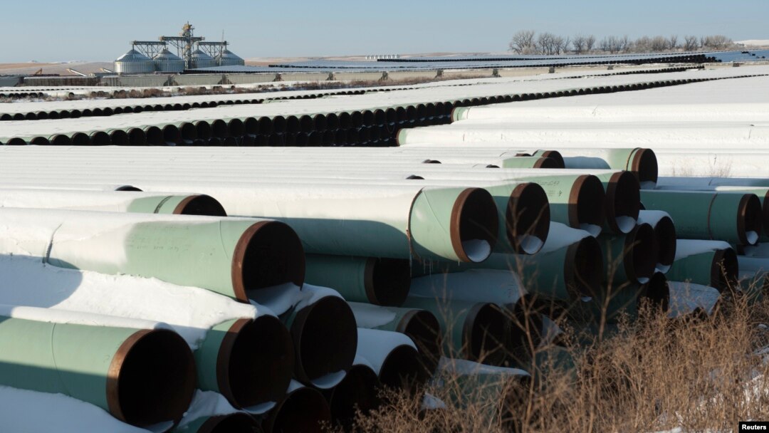 FILE - A depot used to store pipes for TransCanada Corp.'s planned Keystone XL oil pipeline is seen in Gascoyne, North Dakota, Nov. 14, 2014. 