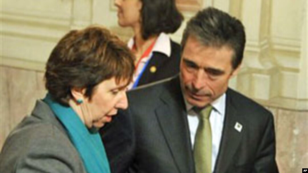 European Union foreign policy chief Catherine Ashton and NATO Secretary-General Anders Fogh Rasmussen during the informal meeting of EU Defense Ministers in Godollo, Hungary, February 25, 2011