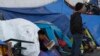 EE.UU. agrega sexta ciudad al controvertido programa "Permanecer en México"