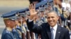 U.S. President Barack Obama waves to the media upon arrival Monday, April 28, 2014 at the Ninoy Aquino International Airport in Manila, Philippines. Trade and security are expected to be discussed in Obama's state visit to the Philippines. (AP Photo/Bulli
