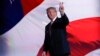 FILE - Republican Presidential Candidate Donald Trump stands on stage during the third day session of the Republican National Convention in Cleveland.