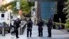 New York City Police Dept. officers arrive outside the Time Warner Center, in New York, Oct. 24, 2018. A police bomb squad was sent to CNN's offices in New York City and the newsroom was evacuated because of a suspicious package.