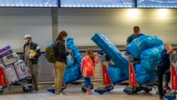 VOA Asia - New testing requirements for travelers