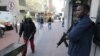 A private security guard stands outside of an ATM machine in downtown Cape Town, South Africa, June 9, 2010.
