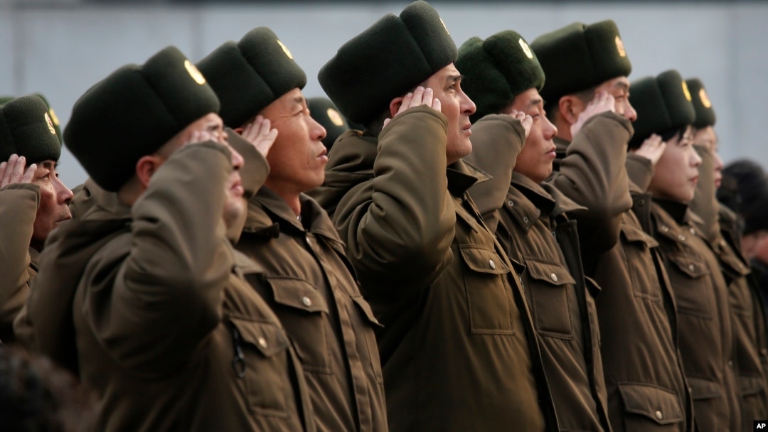 FILE - North Korean soldiers salute before the statues of North Korea's late leader Kim Jong Il, and his father, North Korea's founder Kim Il Sung, in Pyongyang, North Korea, Feb. 16, 2014.