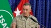 Top U.S. military commander in Afghanistan, Joseph Dunford, talks to media representatives at the ISAF headquarters in Kabul, June, 18, 2013. 