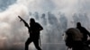 Turkish police clash with protestors at a May Day demonstration in Istanbul, May 1, 2013.