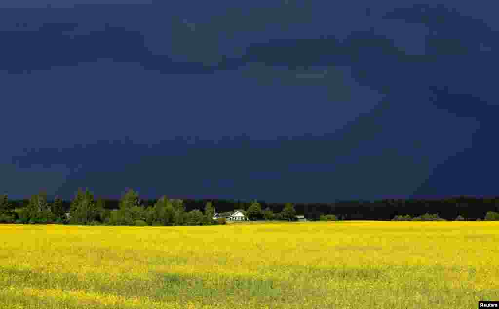 Stormy sky is seen over the village of Vatslavova, Belarus, May 24, 2018.