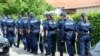 German police officers search property around the house of District President of Kassel Walter Luebcke, who was found dead in Wolfhagen-Istha near Kassel, Germany, June 3, 2019.