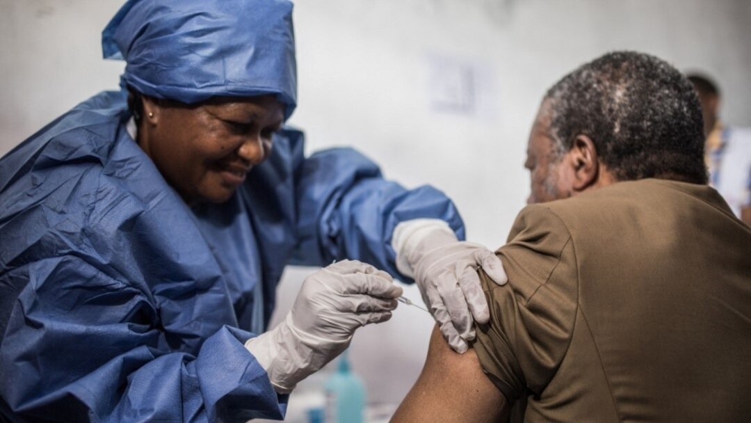 Dr. Jean-Jacques Muyembe Tamfun gets inoculated with an Ebola vaccine in Goma, DRC, Nov. 22, 2019.