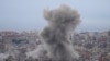 Smoke rises between buildings hit in a Israeli airstrike in Dahiyeh, in the southern suburb of Beirut, Lebanon, Nov. 17, 2024. 