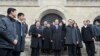 Taiwan's Mainland Affairs Minister Wang Yu-chi (front R) waves as he leaves after visiting the Sun Yat-sen mausoleum in Nanjing, Jiangsu province, Feb. 12, 2014. 