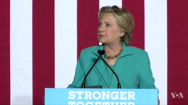 Democrat Clinton Calls Timing of FBI Email Probe 'Strange'