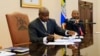 Uganda President Yoweri Museveni signs an anti-homosexual bill into law at the state house in Entebbe, 36 km (22 miles) southwest of capital Kampala, February 24, 2014. 