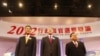 Hong Kong Chief Executive candidates (L-R) Leung Chun-ying, Henry Tang and Albert Ho stand on the stage after a live television debate in Hong Kong, March 16, 2012.
