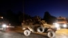 An armored vehicle escorts a Turkish military convoy in the border town of Akcakale in Sanliurfa province, Turkey, October 12, 2019. REUTERS/Murad Sezer