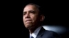 FILE - President Barack Obama pauses while speaking at the LBJ Presidential Library.