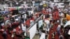 Visitors attend the 2015 Trade Show at the South by Southwest (SXSW) interactive, film and music conference in Austin, Texas, March 15, 2015. 