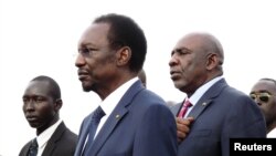 Mali's interim President Dioncounda Traore (C) in the capital Bamako, July 27, 2012.