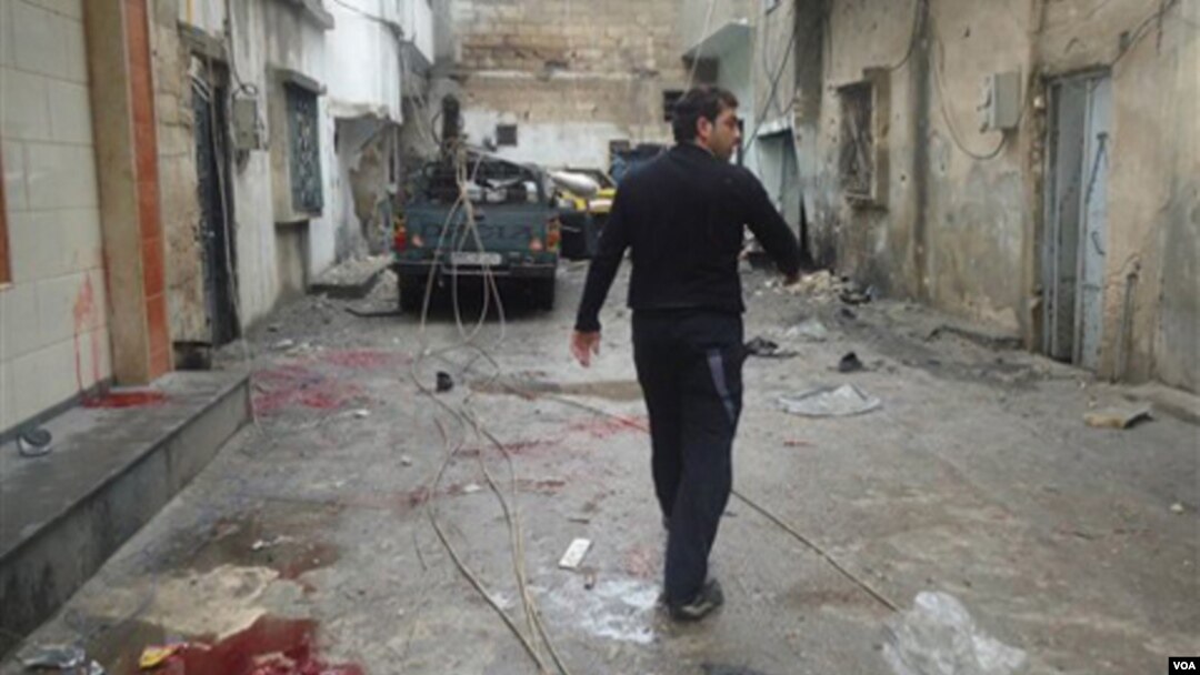 Los tanques fueron retirados de Homs, pero las calles siguen bañadas en sangre.