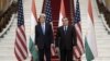 U.S. Secretary of State John Kerry poses with Tajik President Emomali Rahmon upon arriving for a meeting at the Palace of Nations in Dushanbe, Tajikistan, Nov. 3, 2015. 