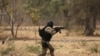 A soldier from Burkina Faso participates in a simulated raid during the U.S. sponsored Flintlock exercises in Ouagadougou, Burkina Faso February 24, 2019.